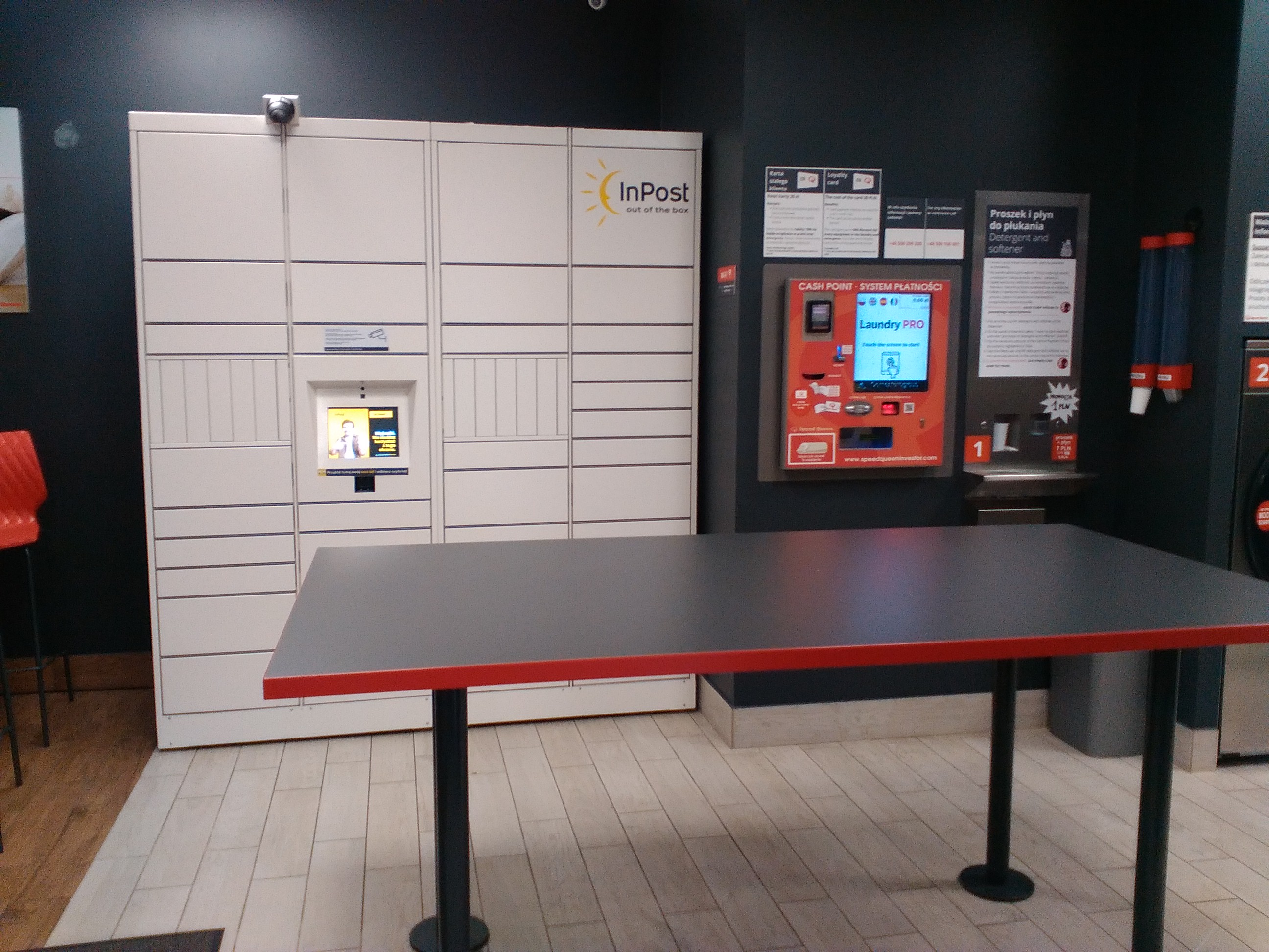 The interior of a laundromat; contextual image